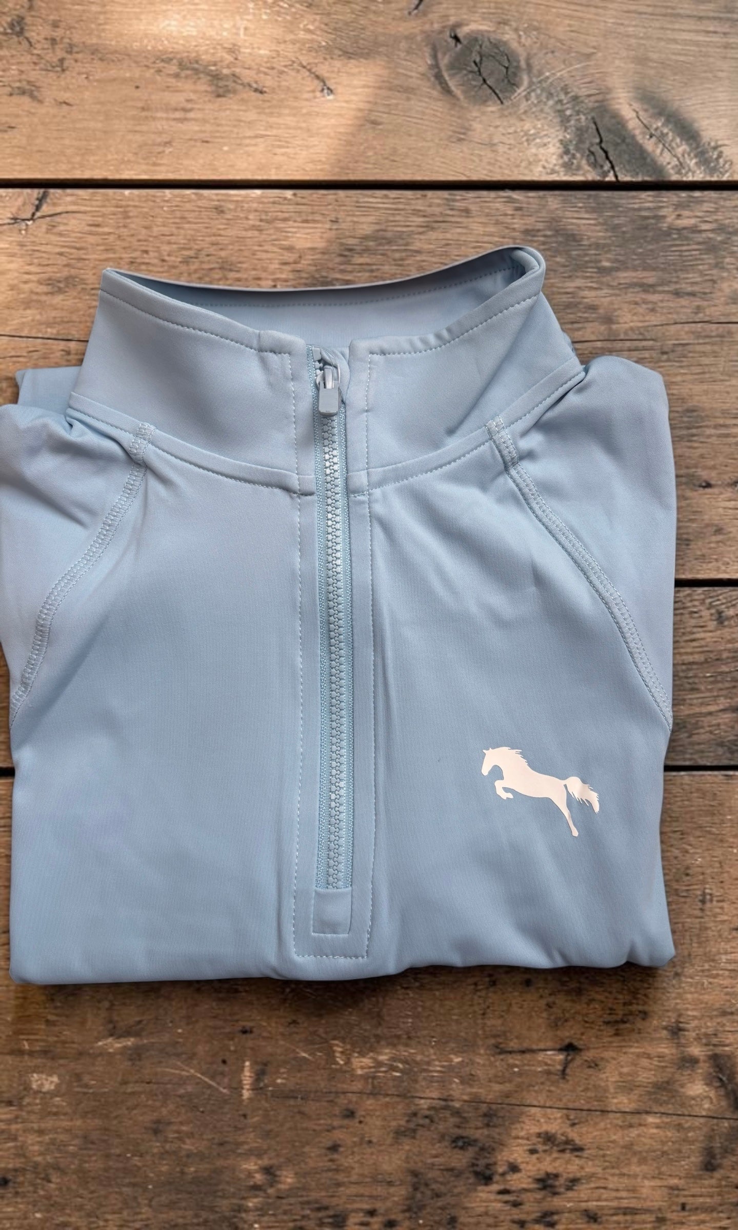 EQUESTRIAN 𝐁𝐀𝐒𝐄 𝐋𝐀𝐘𝐄𝐑 SHORT SLEEVE | BABY BLUE WITH WHITE LOGO PRINT TECHNICAL STRETCH